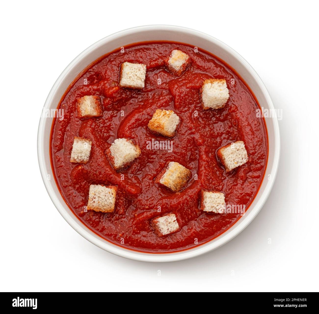 Tomato soup with croutons isolated on white background, top view Stock Photo