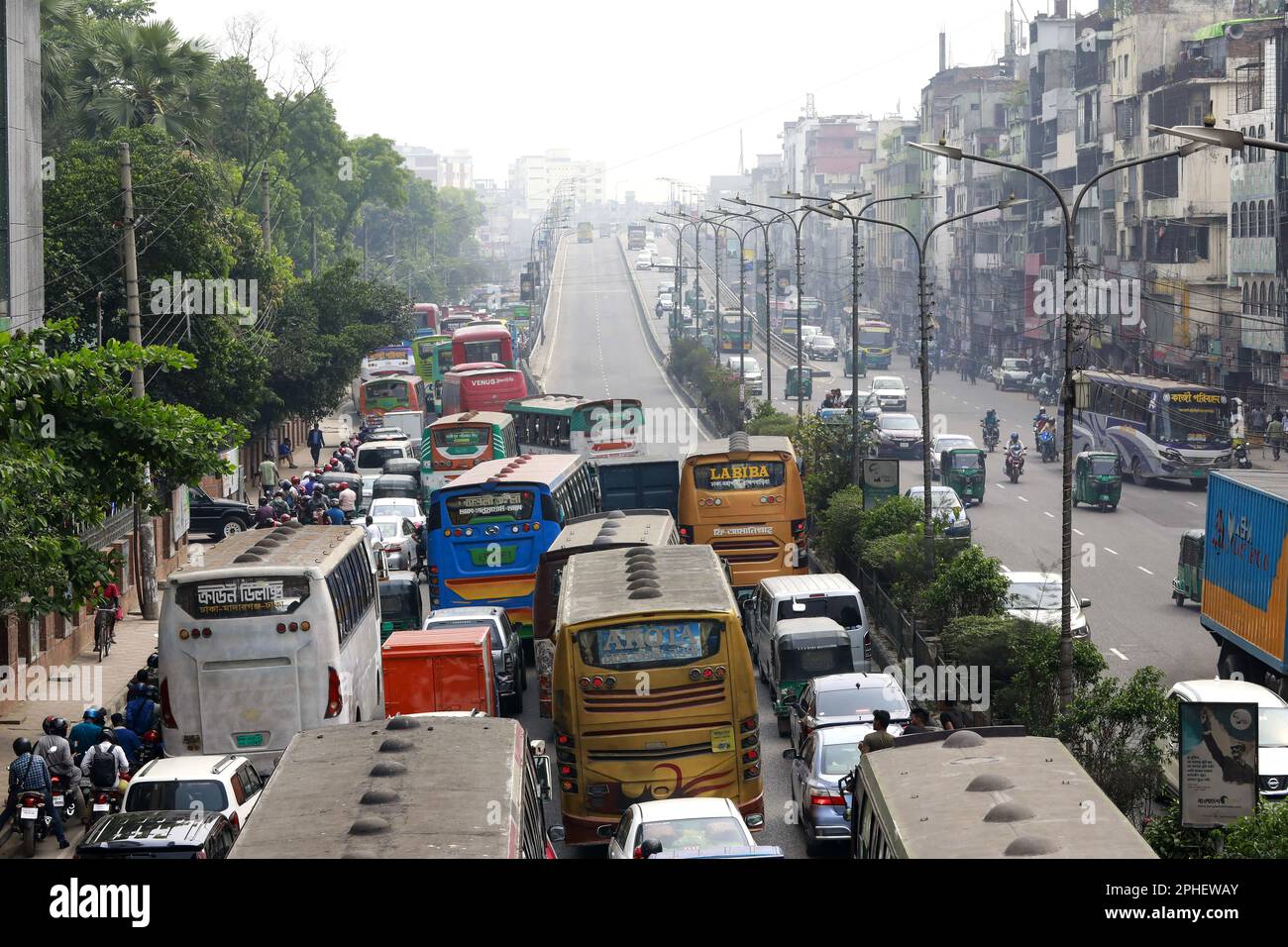 dhaka-bangladesh-28th-mar-2023-numerous-vehicles-jam-on-a-street-in