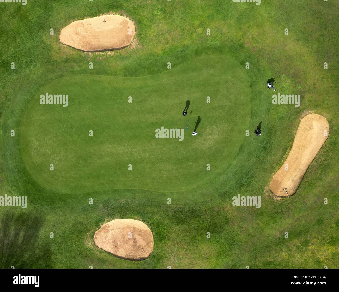 Peterborough, UK. 27th Mar, 2023. A beautiful spring morning as these golfers enjoy a round of golf at Thorpe Wood Golf Course in Peterborough, Cambridgeshire, UK, on 27th March, 2023. Credit: Paul Marriott/Alamy Live News Stock Photo