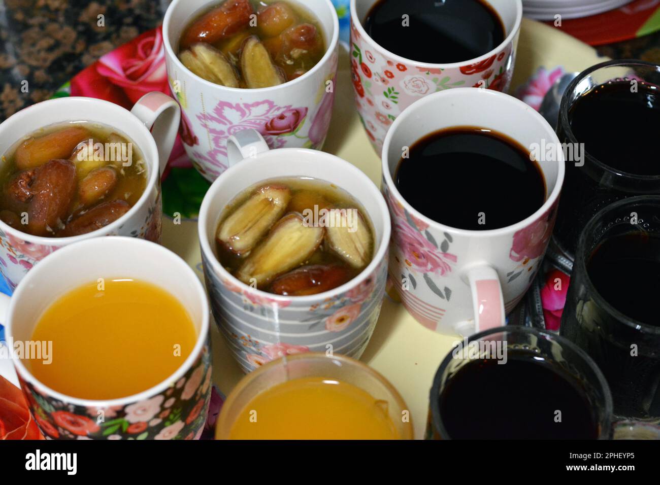 Juices, drinks and compotes tray on the iftar table in Ramadan month