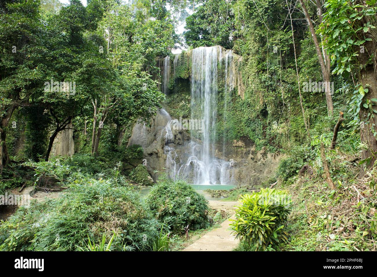 The idyllic Kawasan Waterfall in Siquijor in the Philippines that flow ...