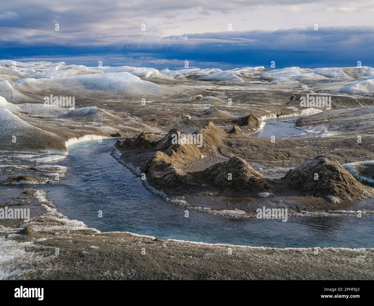 Drainage system with dirt cone on the surface of the ice sheet. The ...