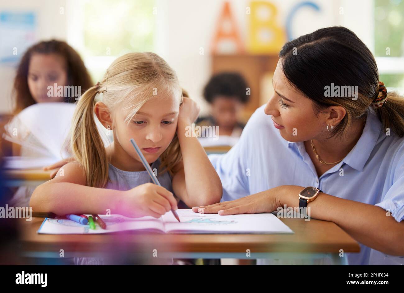 Teacher, learning and sad girl drawing in classroom, studying or ...