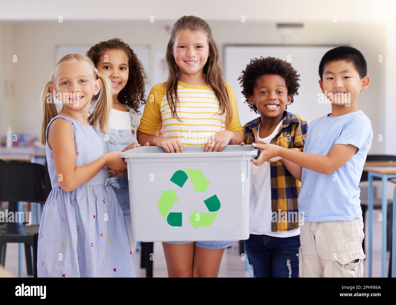 Children, recycle bin and portrait in classroom for cleaning, climate