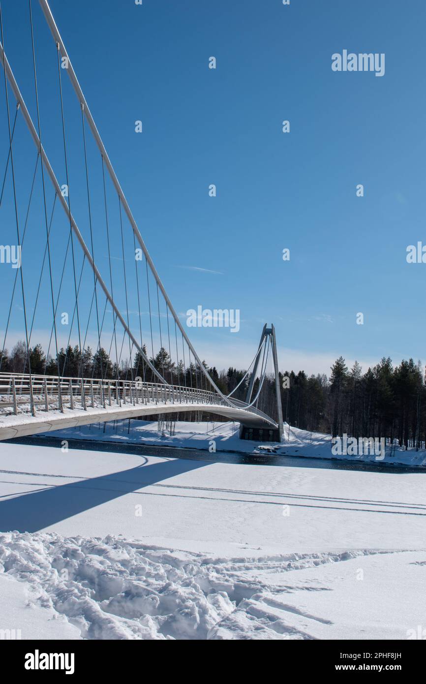 Umea, Norrland Sweden - March 26, 2023: the Lundabron on a sunny winter day. By the Umea River. Vasterbotten in the North of Sweden. Stock Photo