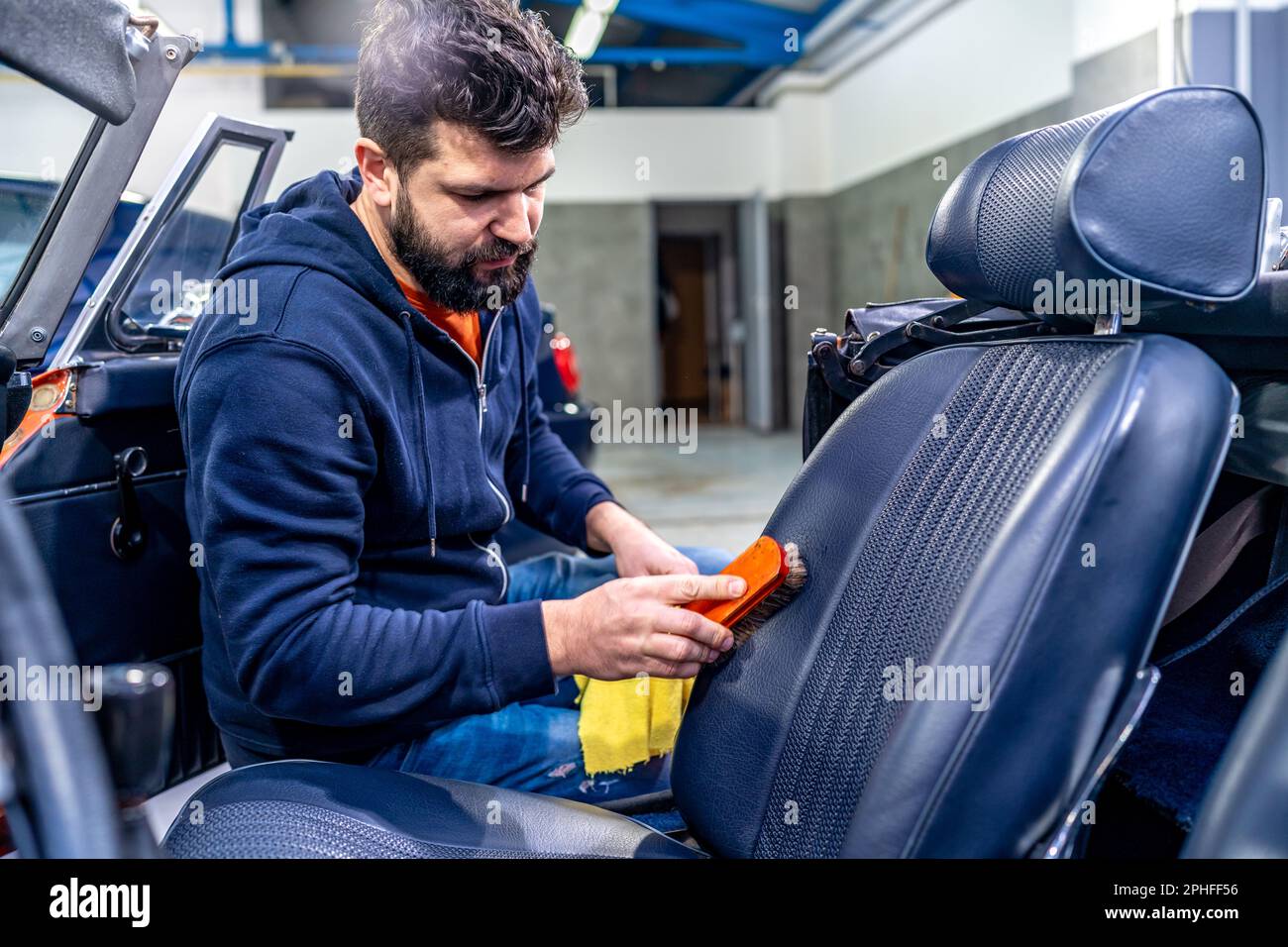 Cleaning Leather Car Seats With A Brush And Chemicals Stock Photo Alamy