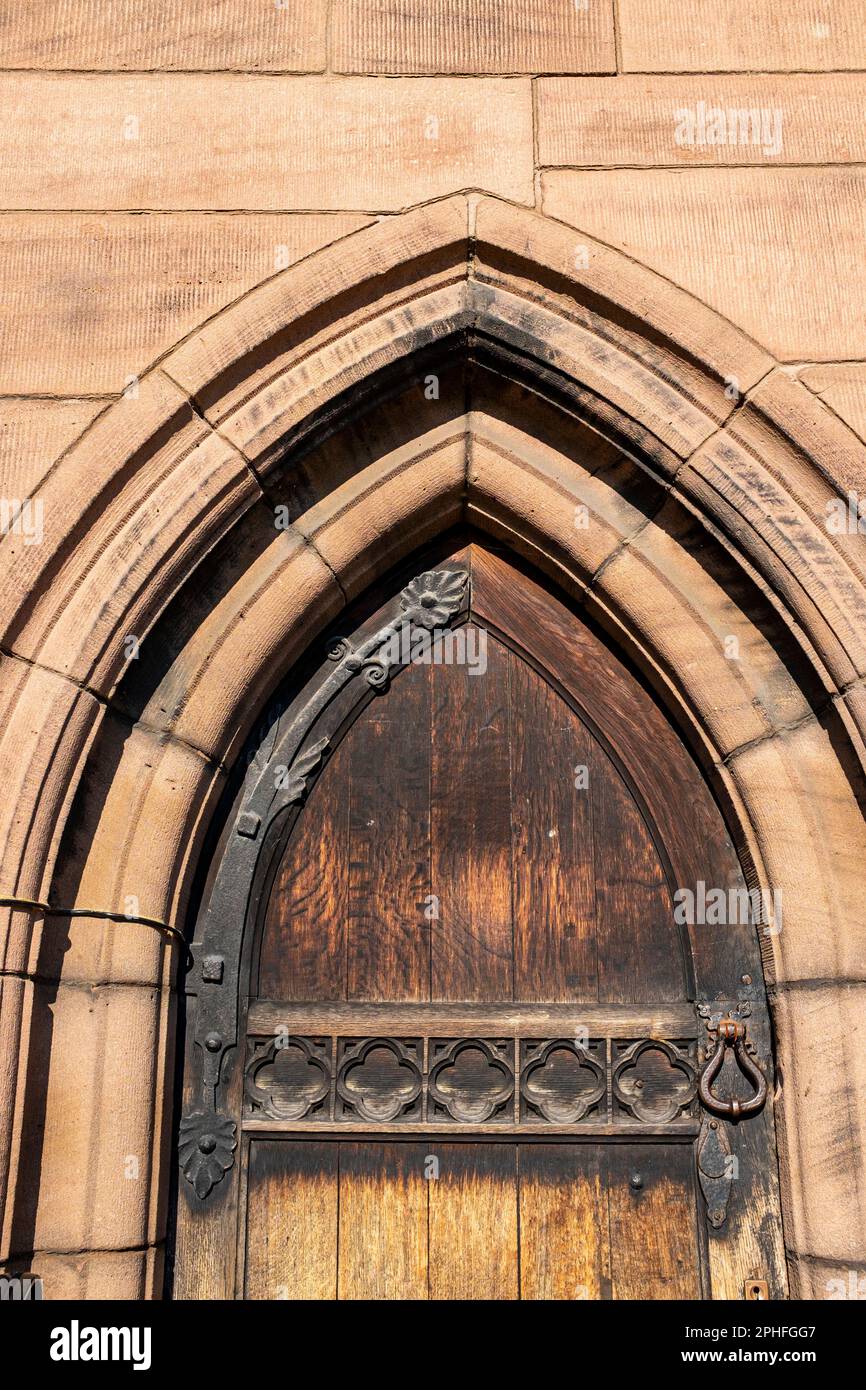 Detail of church door and stone arch UK Stock Photo