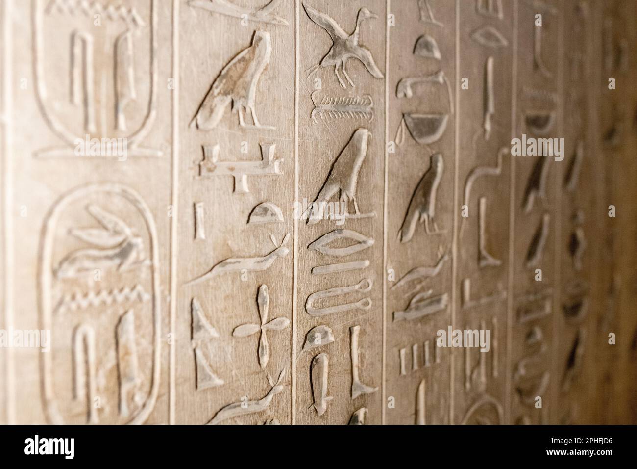 Authentic hieroglyphic inscriptions inside an underground burial chamber in the Pyramid of Unas at the Saqqara Necropolis in Giza, Egypt Stock Photo