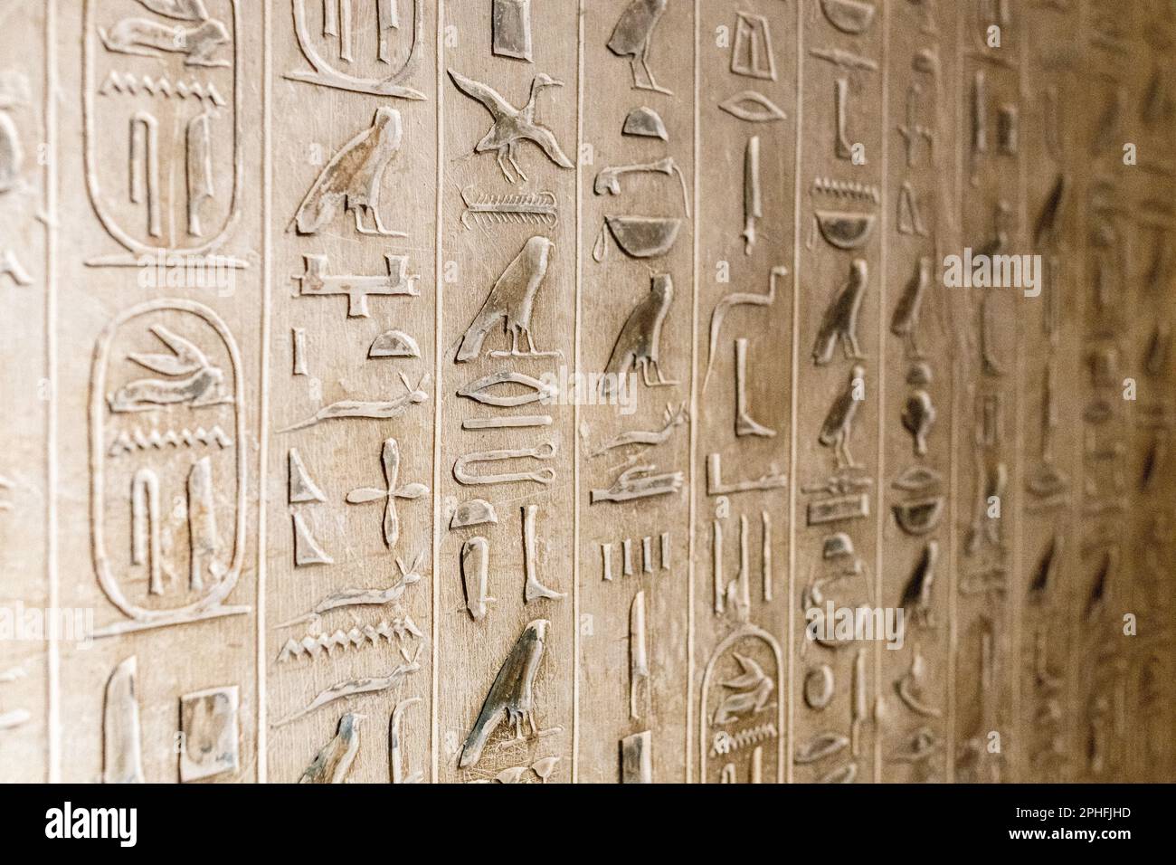 Authentic hieroglyphic inscriptions inside an underground burial chamber in the Pyramid of Unas at the Saqqara Necropolis in Giza, Egypt Stock Photo