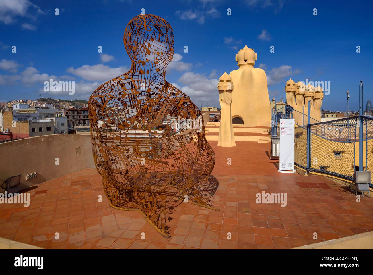 Sculpture 'Silent Music IV' (2019) by the artist Jaume Plensa in the terrace of the Casa Milà - La Pedrera in spring, 2023, Barcelona, Catalonia Spain Stock Photo