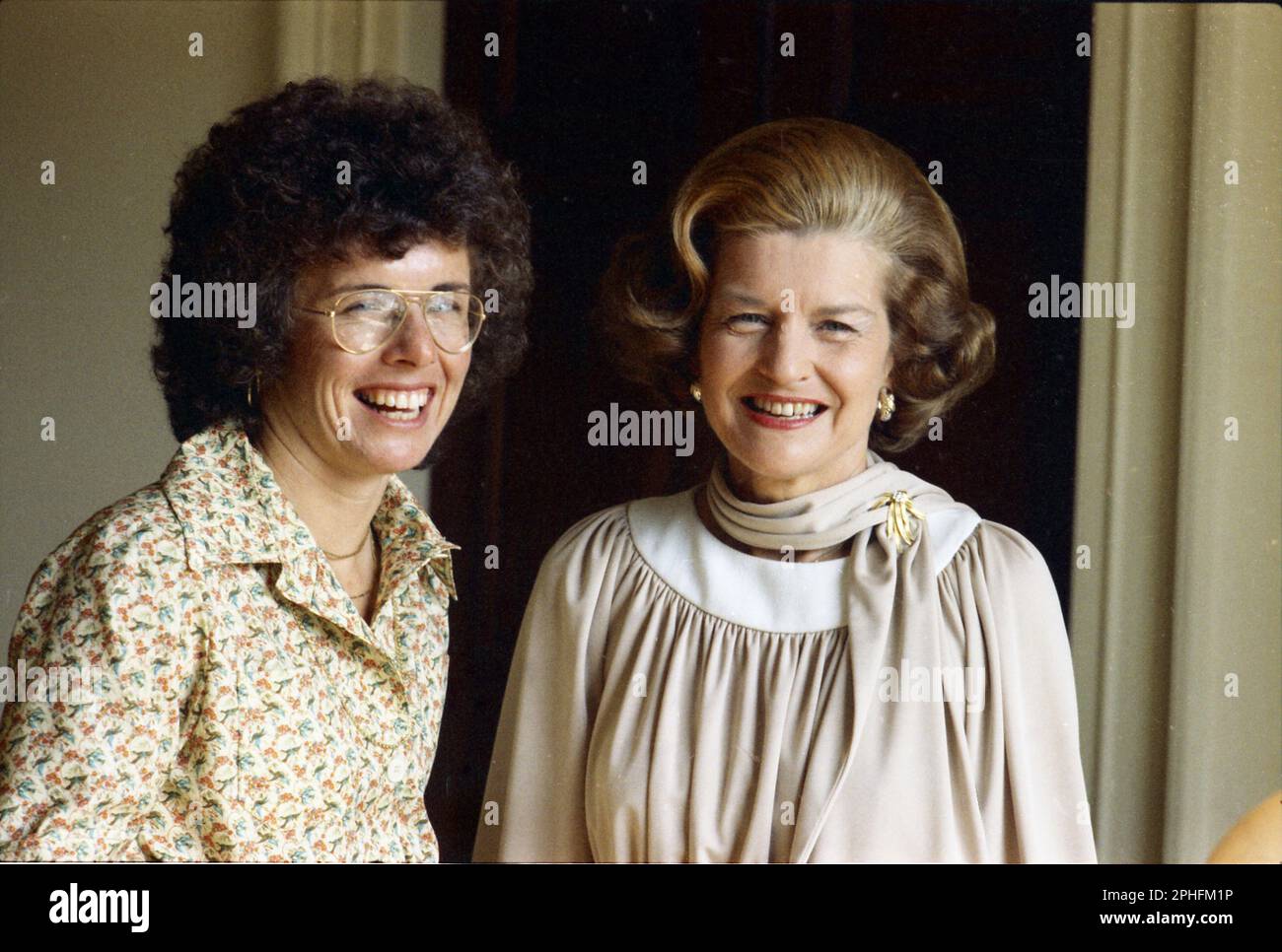 Billie Jean King, professional tennis player and Wimbledon Champion, poses with First Lady Betty Ford at the White House, Washington, DC, 7/21/1975. (Photo by White House Photo Collection Stock Photo