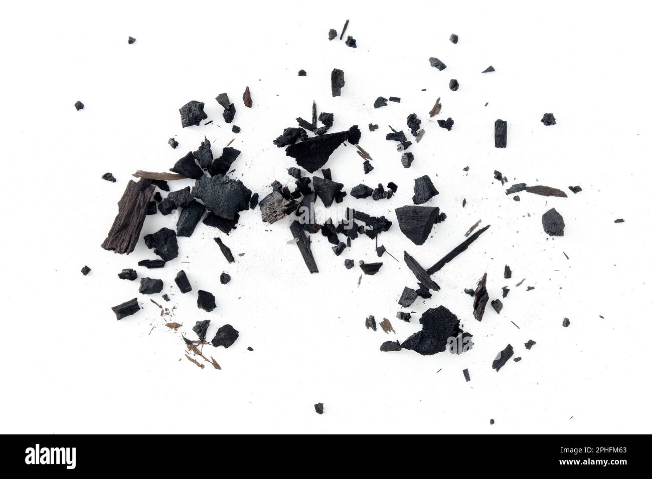 Black charcoal particles isolated on a white background, Activated