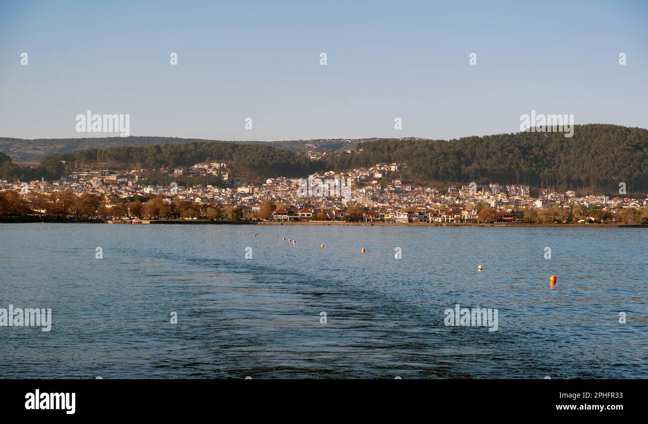 Giannena city Pamvotis Lake, Epirus Greece. View from boat of built next to water Ioannina town background, historical traditional destination. Stock Photo