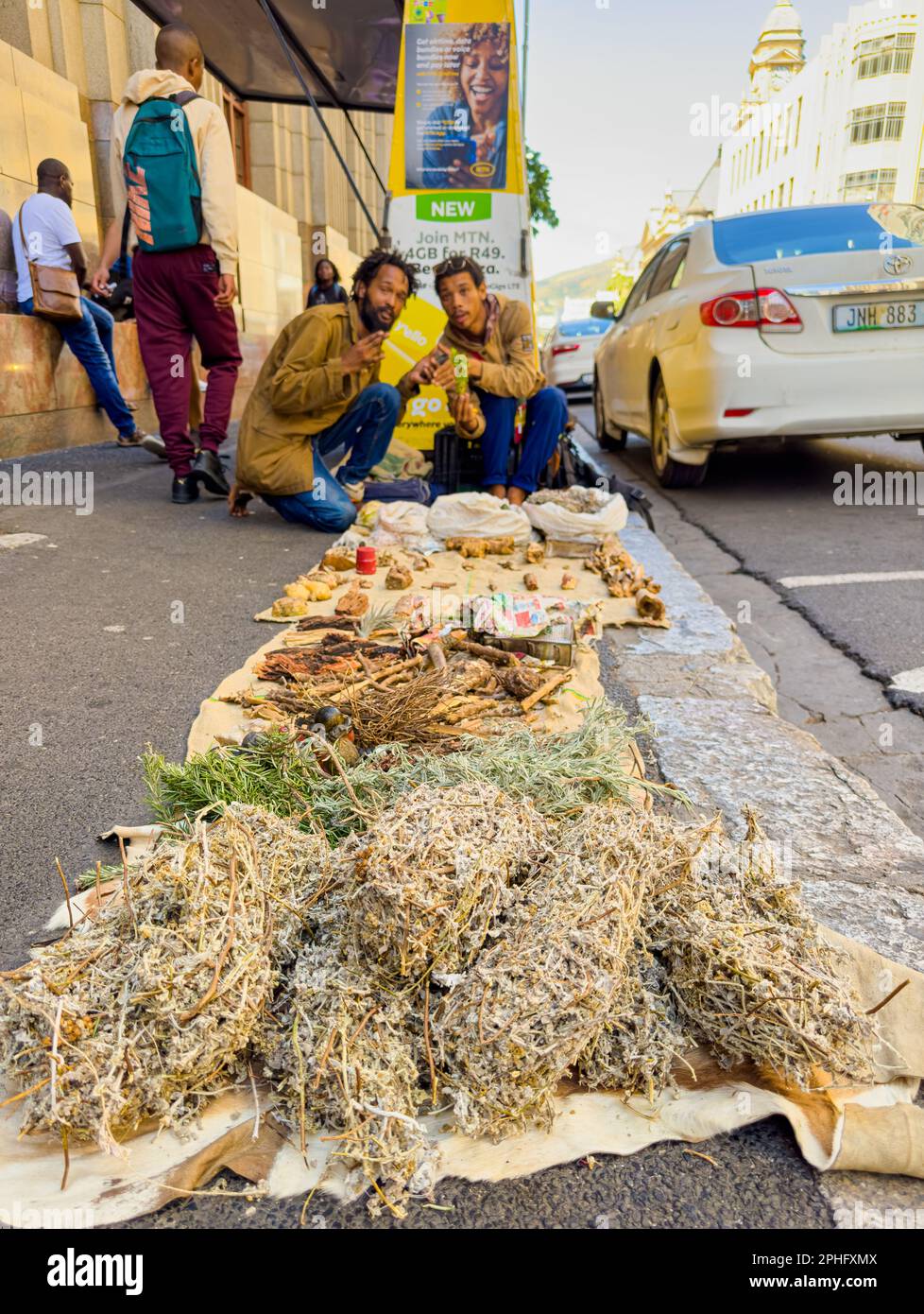 Cape Town, South Africa - March 15, 2023: Rastafarian traditional healers selling natural medicine on city street Stock Photo