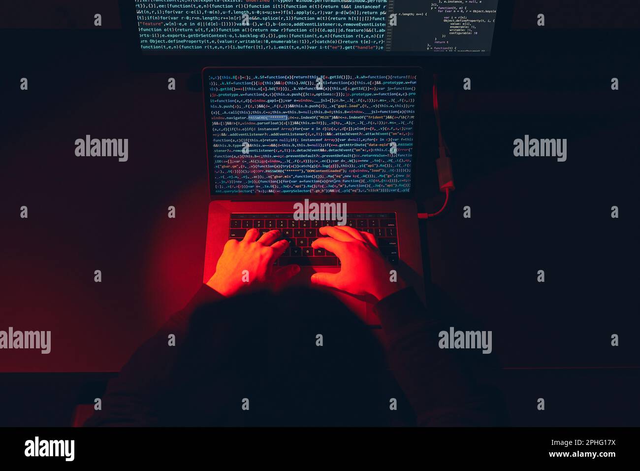 Man using computer and programming  to break code. Cyber security threat. Internet and network security. Stealing private information. Person using te Stock Photo