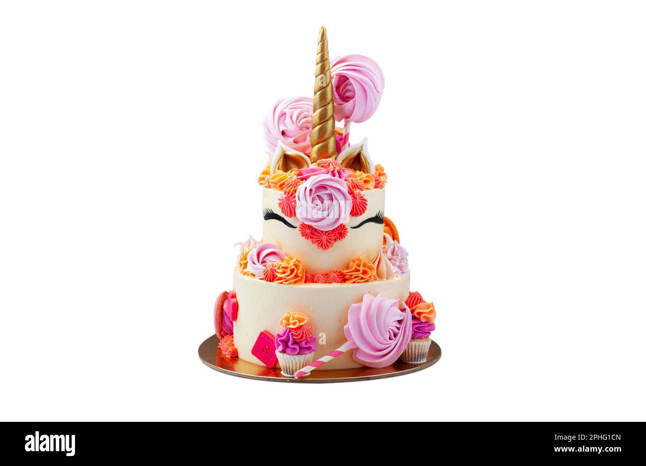 https://c8.alamy.com/comp/2PHG1CN/tall-and-bright-unicorn-cake-with-chocolate-meringue-swirls-and-cupcakes-isolated-on-white-background-with-copy-space-on-a-side-horizontal-2PHG1CN.jpg