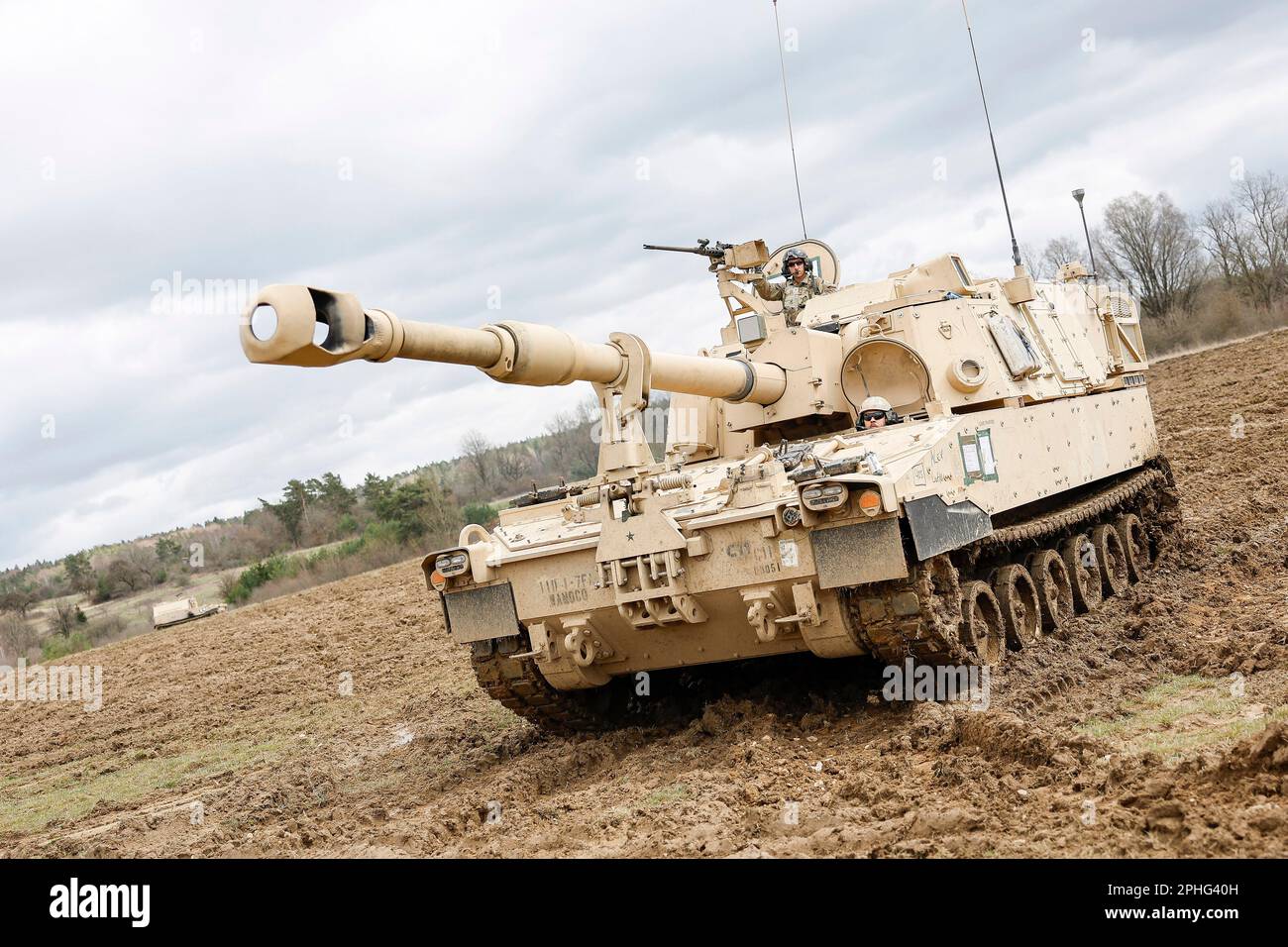 28 March 2023, Bavaria, Grafenwöhr: A U.S. M109A7 Paladin self-propelled  howitzer drives during the "Dynamic Front 2023" artillery exercise at the  Grafenwoehr training area. Around 1,700 soldiers from 18 nations are  involved