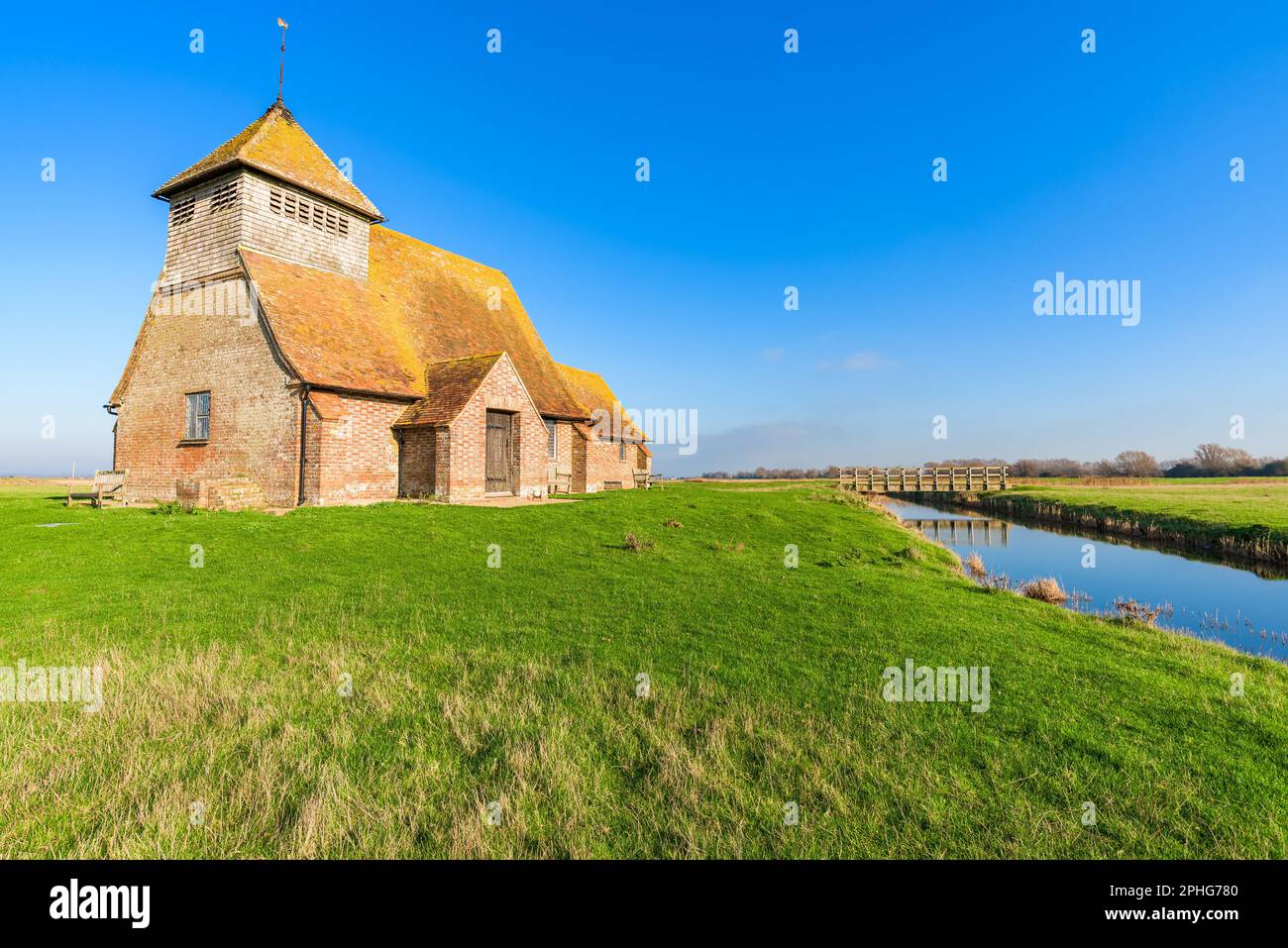 St Thomas à Becket Church in Fairfield, Kent, on a sunny day. Stock Photo