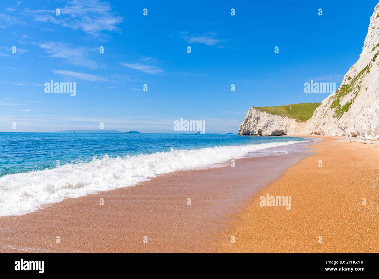 White chalk cliffs of Bat's Head and White Nothe seen from the beach ...