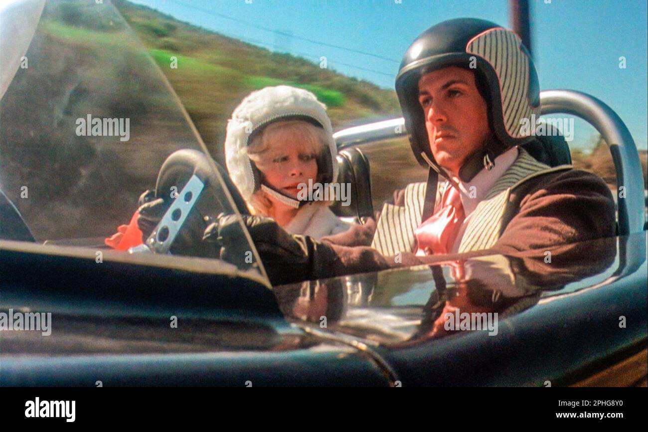 SYLVESTER STALLONE and SIMONE GRIFFETH in DEATH RACE 2000 (1975), directed by PAUL BARTEL. Credit: NEW WORLD INTERNATIONAL / Album Stock Photo