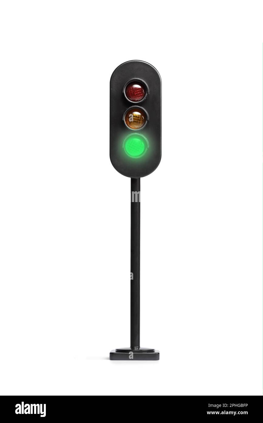 Studio shot of a traffic light with the green light on isolated on white background Stock Photo