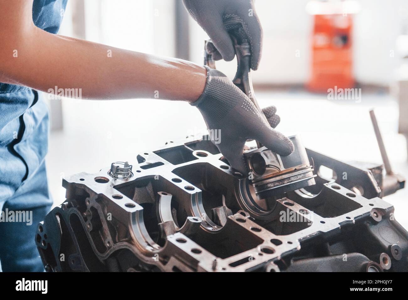 Professional repairman works with broken automobile engine Stock Photo ...
