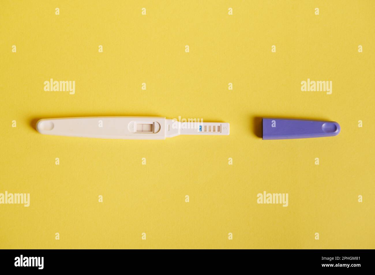 Rapid diagnosis of pregnancy at home. Top view of inkjet pregnancy test