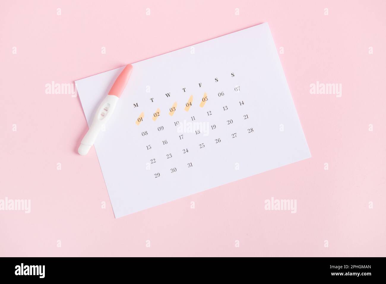 Rapid diagnosis of pregnancy at home. Top view of pregnancy test on