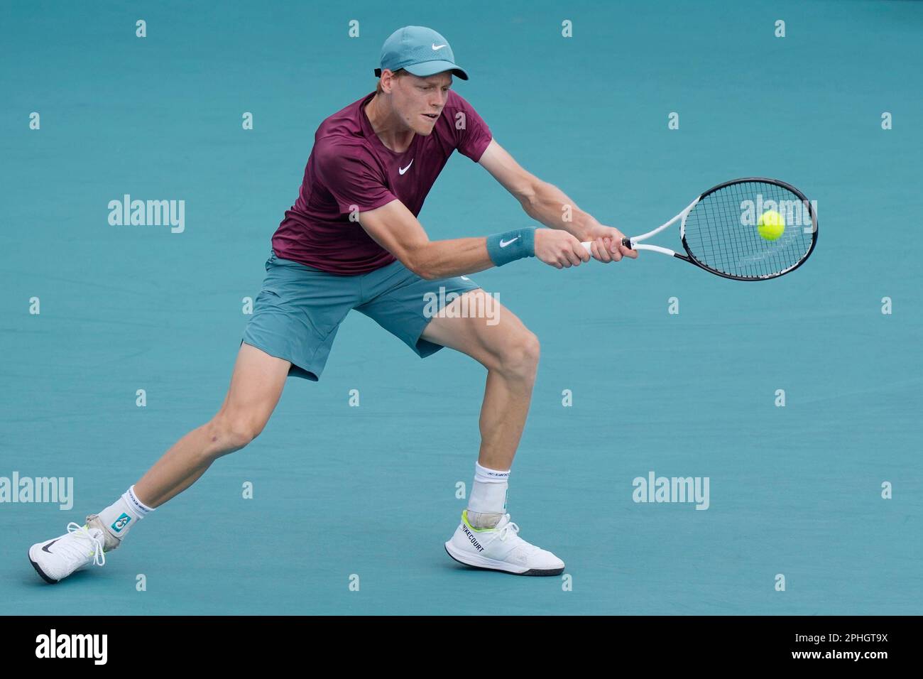 Jannik Sinner of Italy returns to Andrey Rublev during the Miami Open tennis tournament, Tuesday, March 28, 2023, in Miami Gardens, Fla