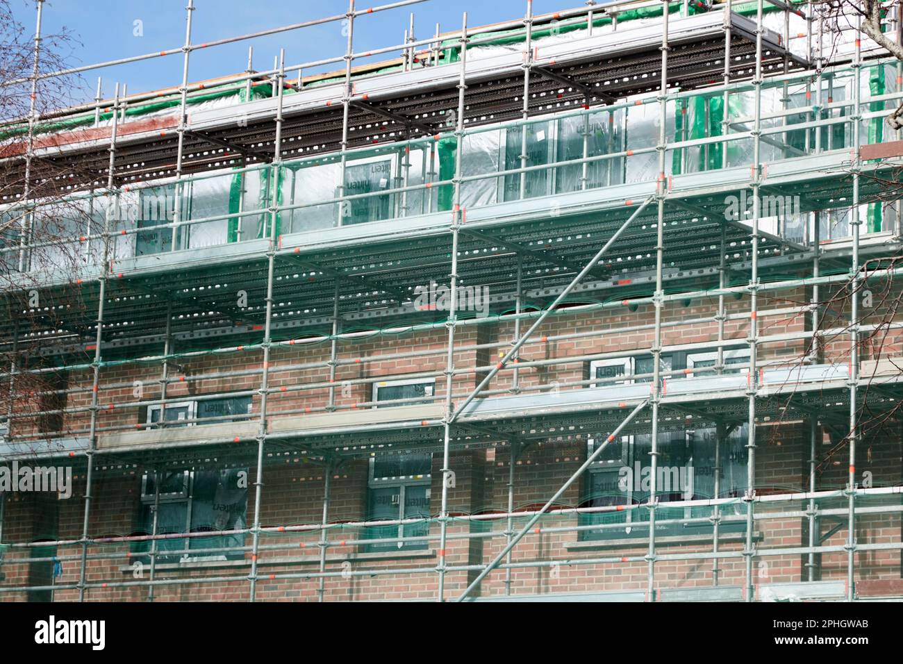 scaffolding and safety nets on construction site building new social housing block strandtown, east belfast, northern ireland, uk Stock Photo