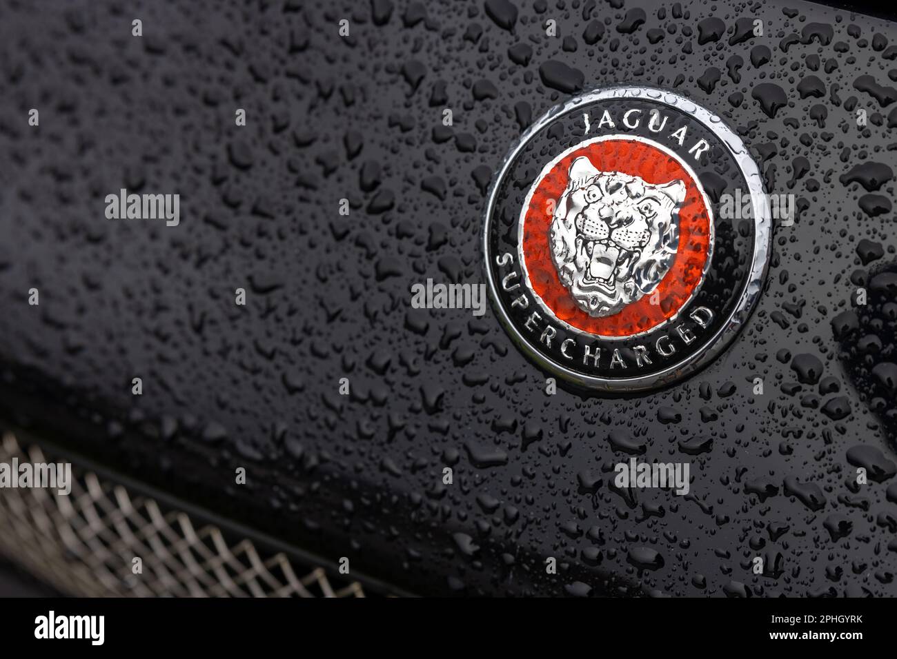 Jaguar XKR Supercharged badge Stock Photo Alamy