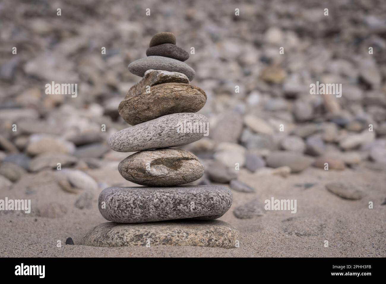 stack of stones on beach Stock Photo