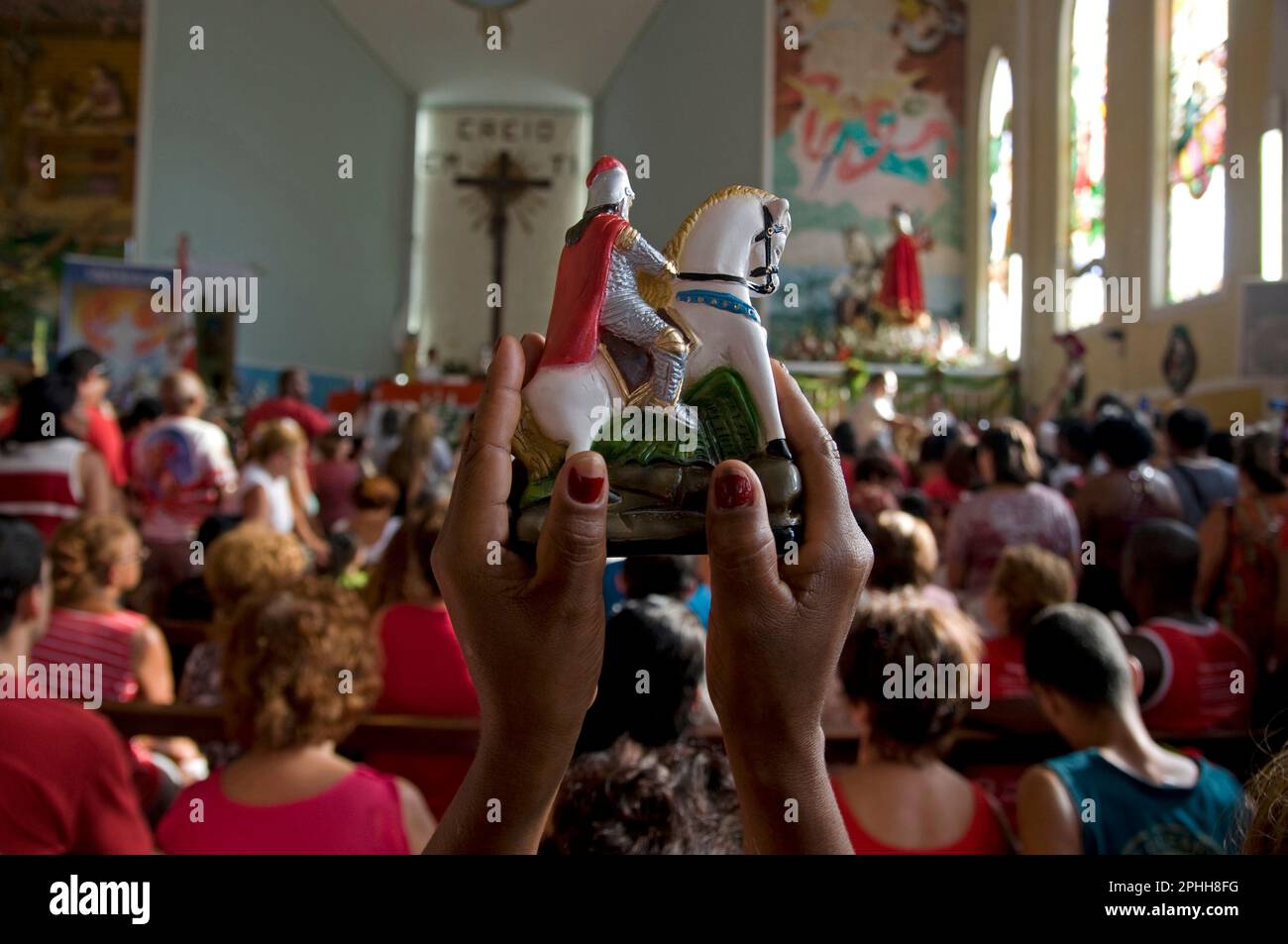 Afro-Brazilian and catholic religious syncretism, Saint George celebration in Quintino, Rio de Janeiro, Brazil. Saint George, born in Lydda, Palestine, was a soldier in the Roman army and was later venerated as a Christian martyr - he is revered in many cults of african-Brazilian religions. Stock Photo