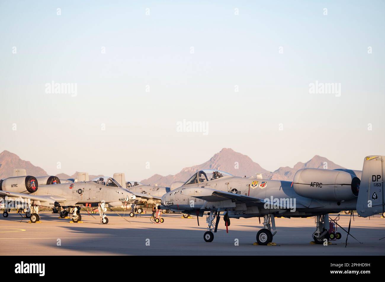 A-10C Thunderbolt IIs assigned to the 355th Wing sit on the flight line at Davis-Monthan Air Force Base, Ariz., March 27, 2023. DM's runway is the busiest single runway in the Air Combat Command. (U.S. Air Force photo by Staff Sgt. Kristine Legate) Stock Photo