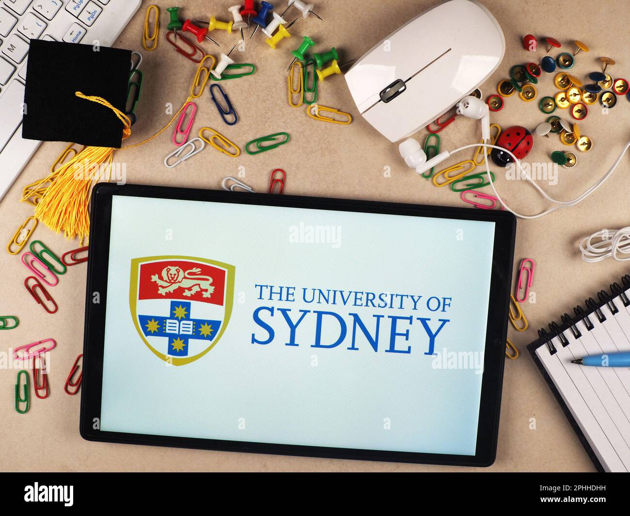 In this photo illustration, The University of Sydney logo seen displayed on a tablet Stock Photo