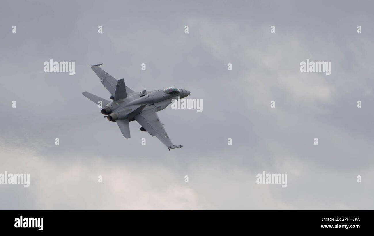 A Finnish Air Force F/A-18C Hornet takes-off at Royal Air Force Waddington, England, prior to a training mission during Exercise Cobra Warrior 23-1 March 21, 2023. Finland is among six other nations participating in this iteration of Cobra Warrior, increasing interoperability between NATO Allies and Partners. (U.S. Air Force photo by Airman 1st Class Austin Salazar) Stock Photo