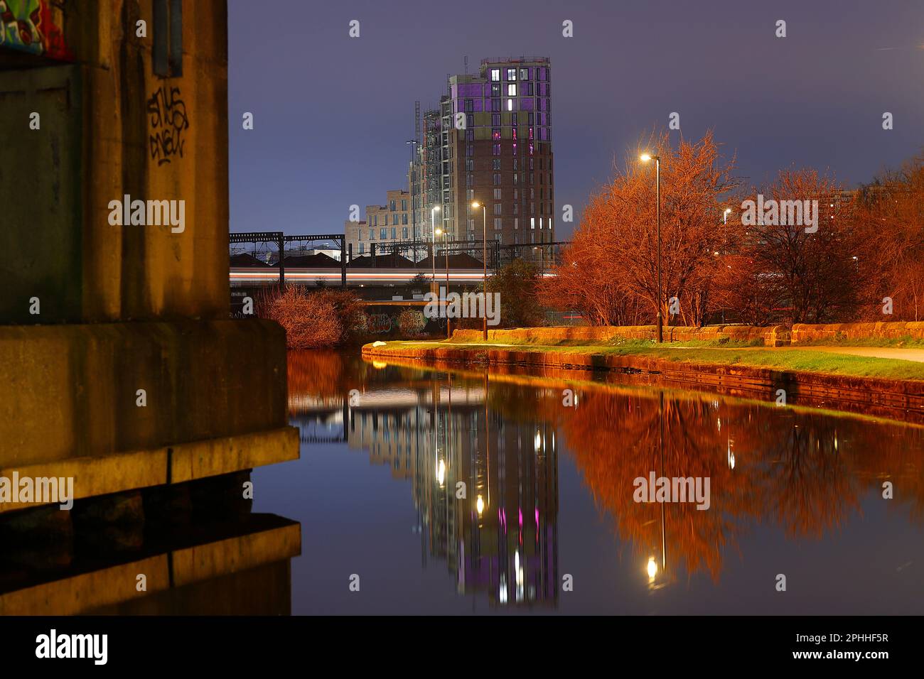 Reflections in the Leeds to Liverpool canal of Springwell Gardens