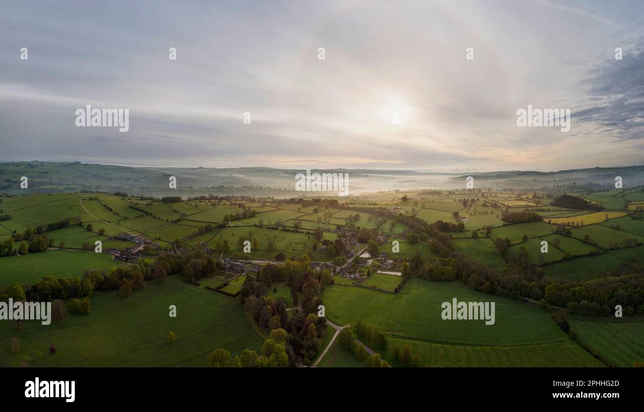 Morning light, the White Peak of the English Peak District, flying over Tissington in a hot air ballon, looking at the landscape of fields and trees Stock Photo