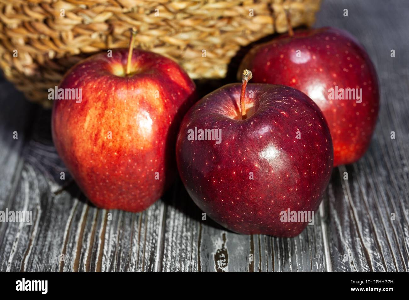 red apples on wood background Stock Photo