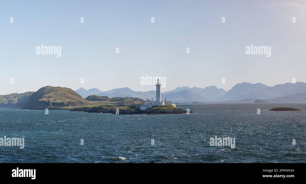 Lismore Lighthouse marking the rocks in the Firth of Lorn, between Mull and Oban in the Inner Hebrides in Scotland, beacon of light helping navigation Stock Photo