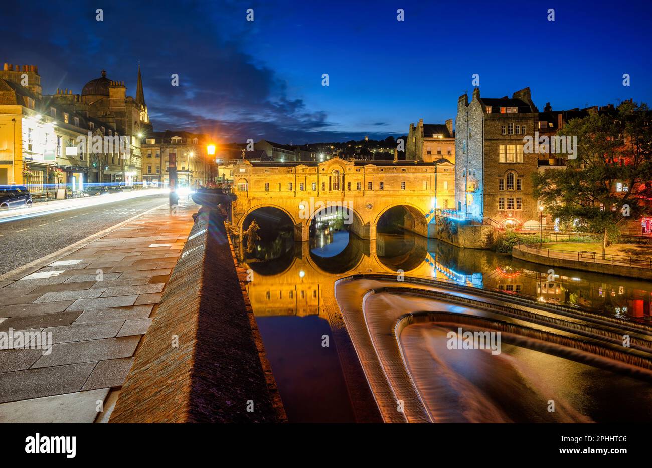 Panoramic night view of Bath city with the historic Pulteney bridge over the Avon river, England, United Kingdom Stock Photo