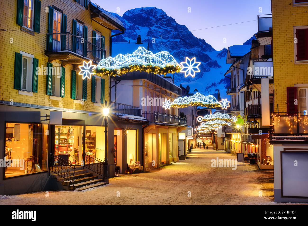 Christmas decorations on the streets of the Old town center of Engelberg village, a popular ski resort in Alps mountains, Central Switzerland Stock Photo