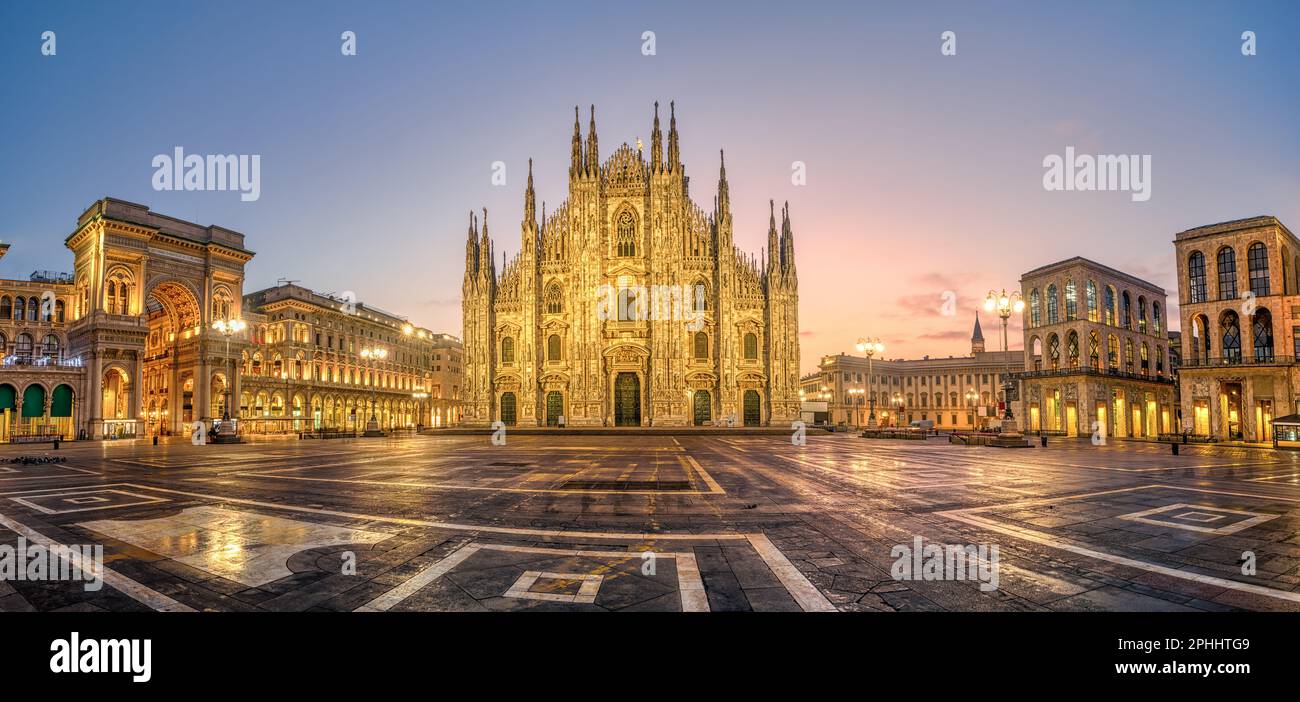 Panoramic view of Piazza del Duomo square with Milan Cathedral, Duomo di Milano, and Galleria Vittorio Emanuele II, Italy, on sunrise. Milan Cathedral Stock Photo