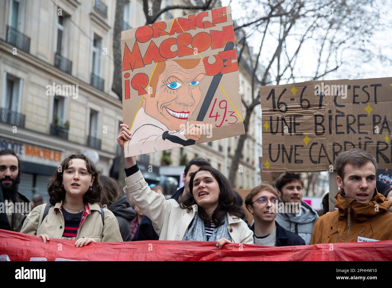 PARIS, France. 28th Mar, 2023. Mass demonstrations in Paris over pension reform. President Macron wants to introduce a bill which will raise the retirement age from 62 to 64. Credit: Lucy North/Alamy Live News Stock Photo