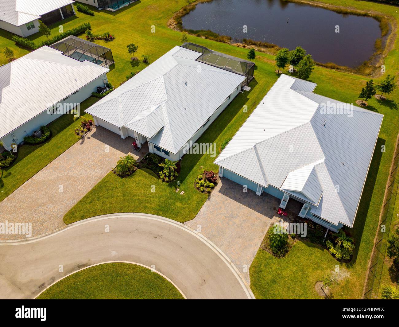 Upscale homes with metal roofs in Vero Beach FL Stock Photo Alamy