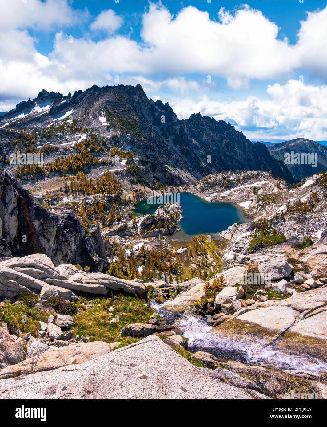 The Granite Peaks of The Enchantments Tower Over Crystal Lake. Cascade