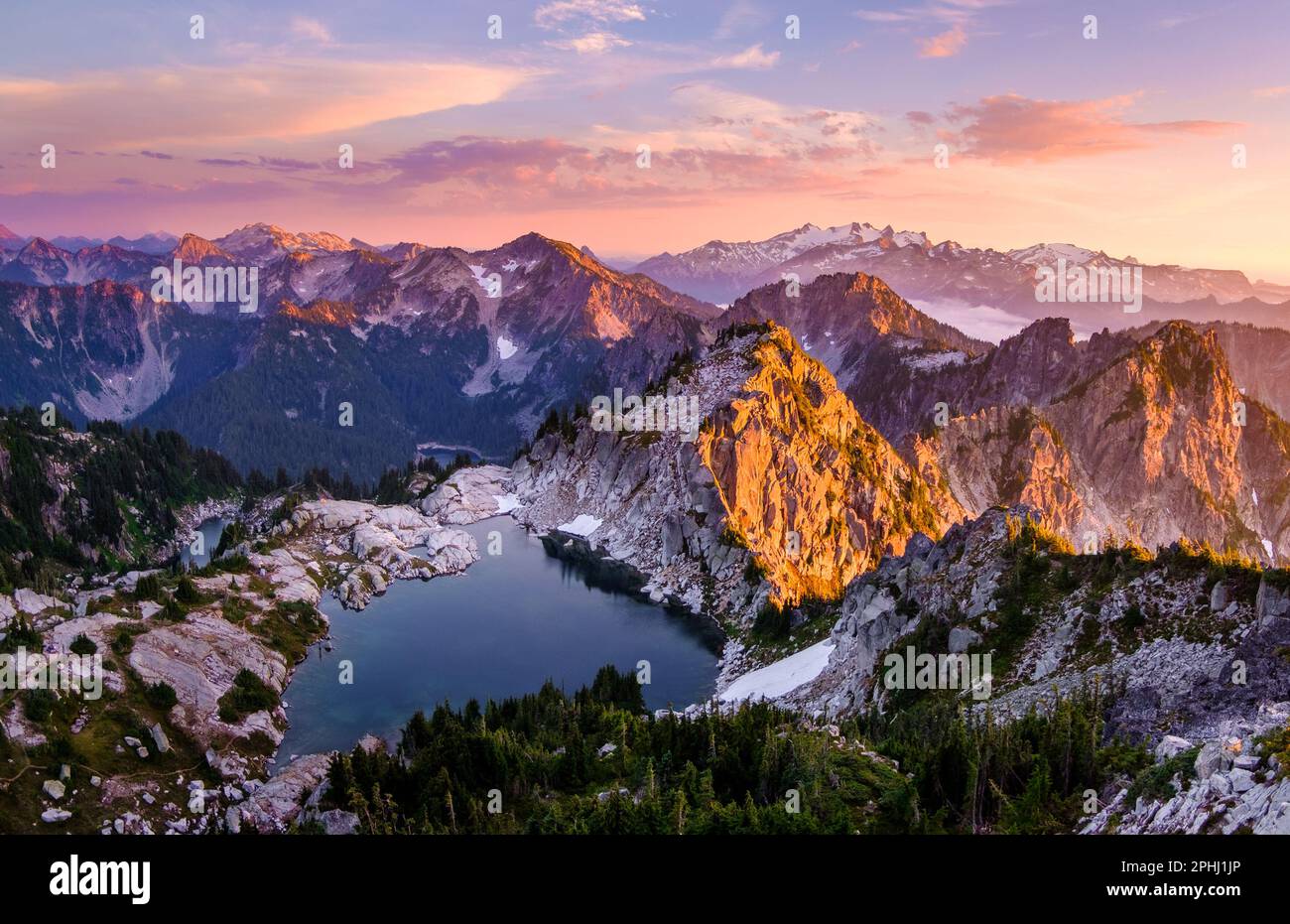Sunset Illuminates Thunder Mountain Lake and Mt Daniel. Cascade Mountain Range, Washington. Stock Photo