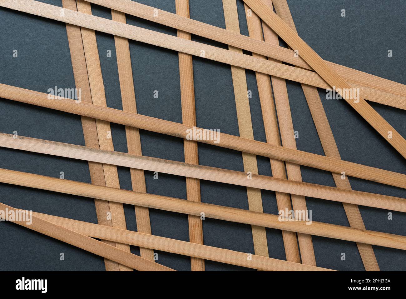 wood straps on gray cardboard paper Stock Photo