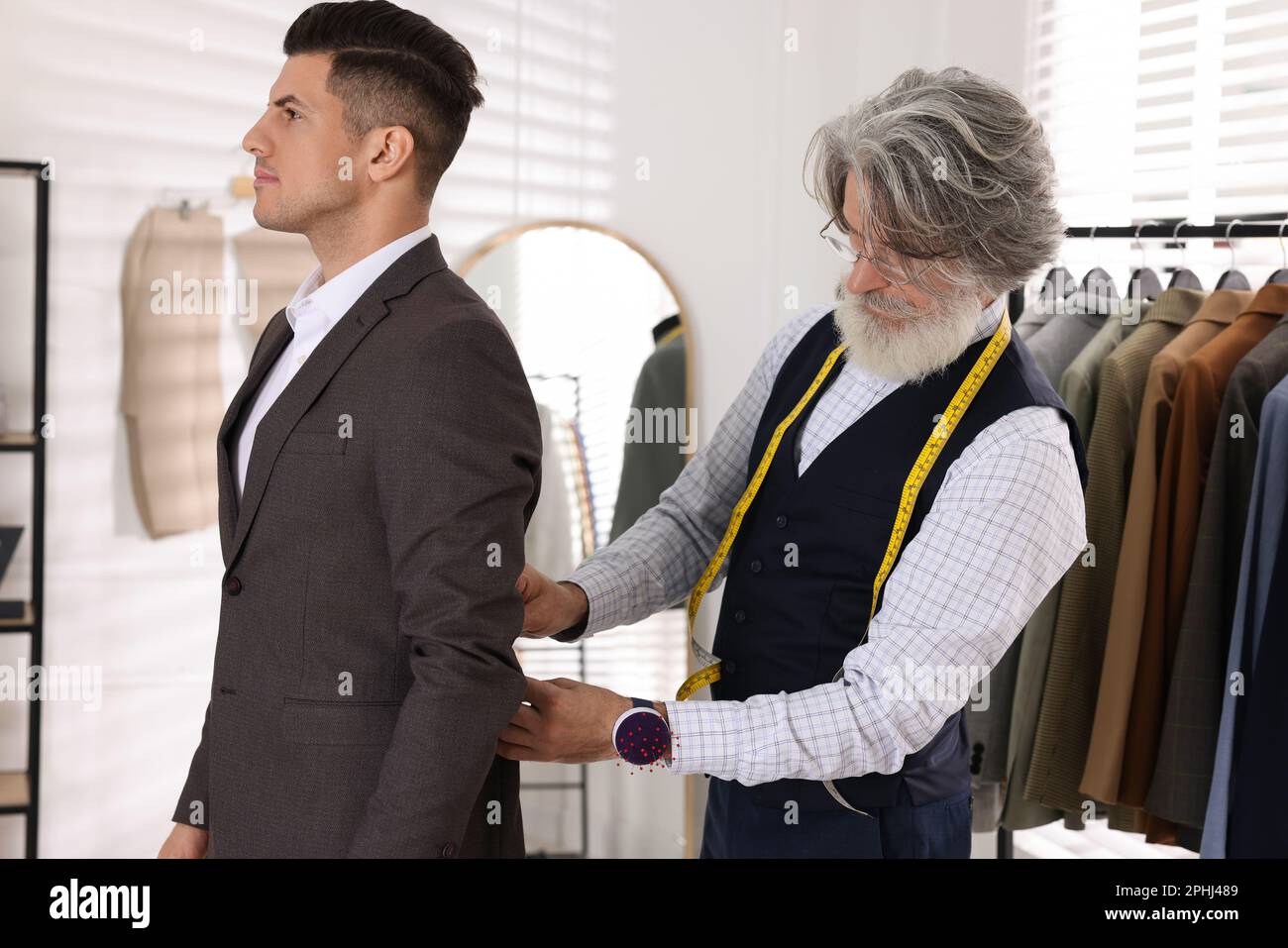 Dressmaker working client in hi-res stock photography and images - Alamy