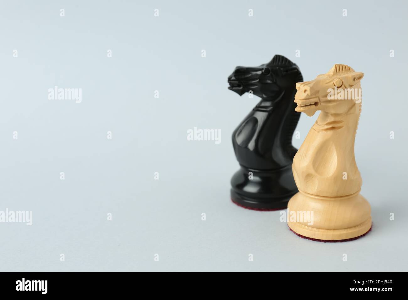 Premium Photo  Wooden chessboard with figures in light and dark brown  tones isolate on a white background